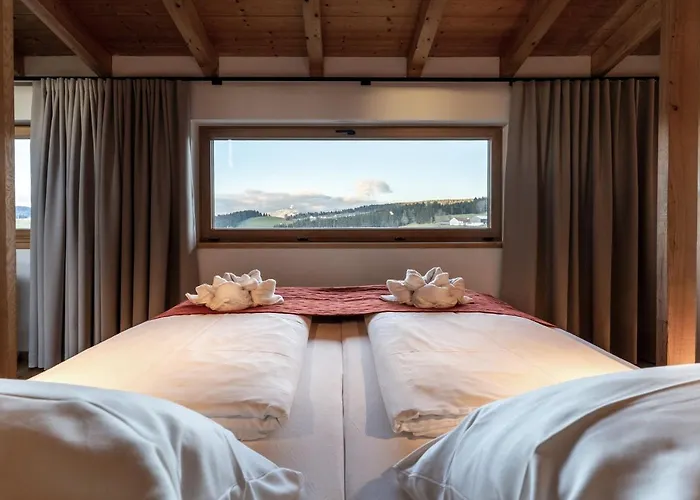 Апартаменты Forstgut - Premium Waldchalets Und