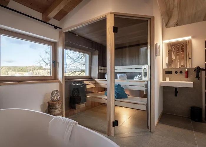Апартаменты Forstgut - Premium Waldchalets Und *