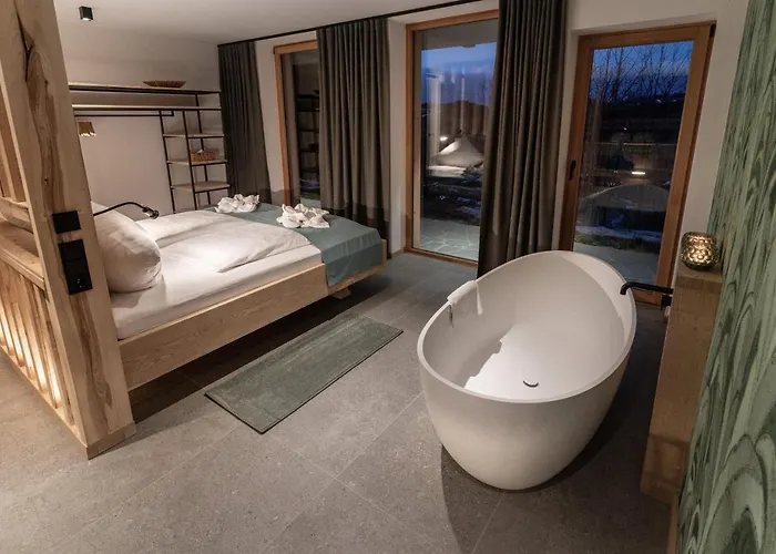 Апартаменты Forstgut - Premium Waldchalets Und *